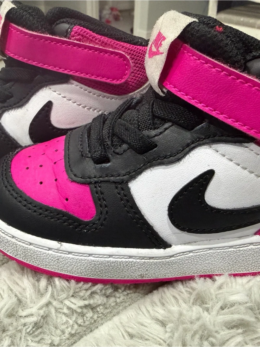 Nike Kids High-Top Sneakers in Black and Hot Pink